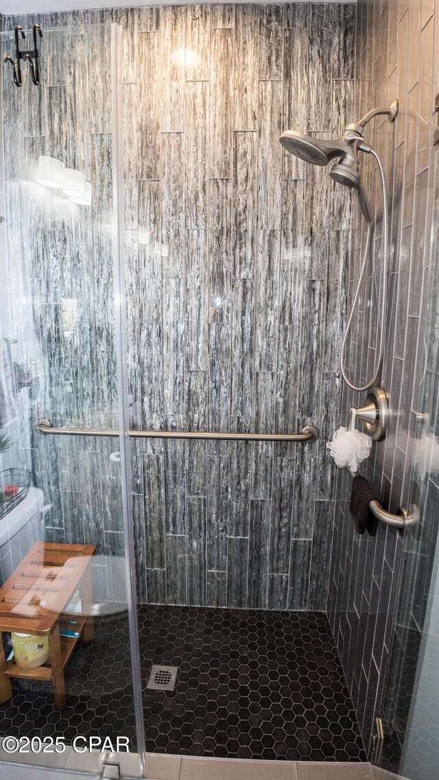 bathroom with a stall shower