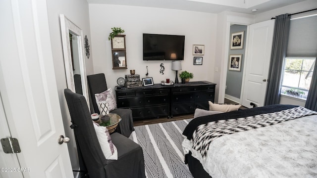 bedroom featuring baseboards