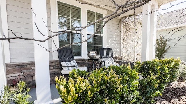 view of side of home with a porch