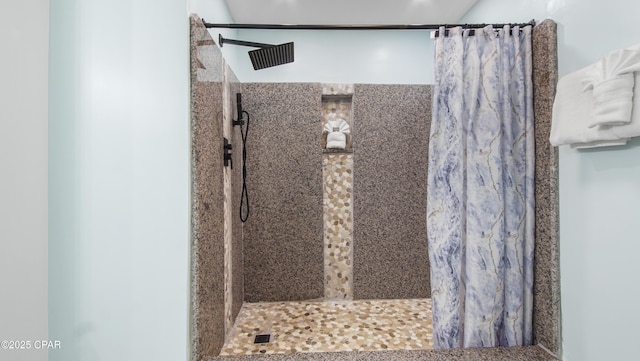 bathroom with a shower with curtain