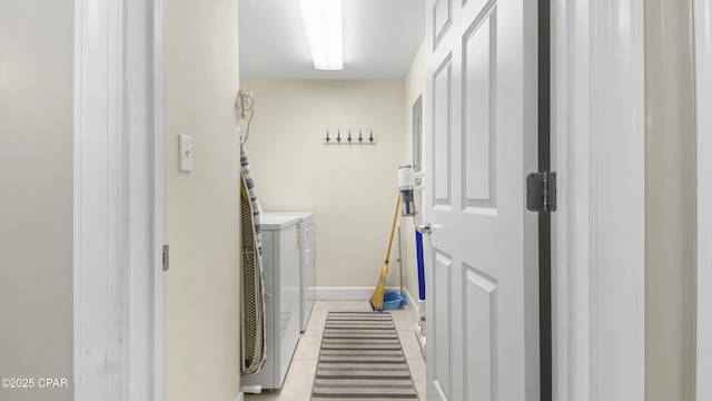 14825 Front Beach Rd Unit 2003, Panama City Beach, FL 32413 - laundry area featuring light tile patterned floors, baseboards, independent washer and dryer, and laundry area