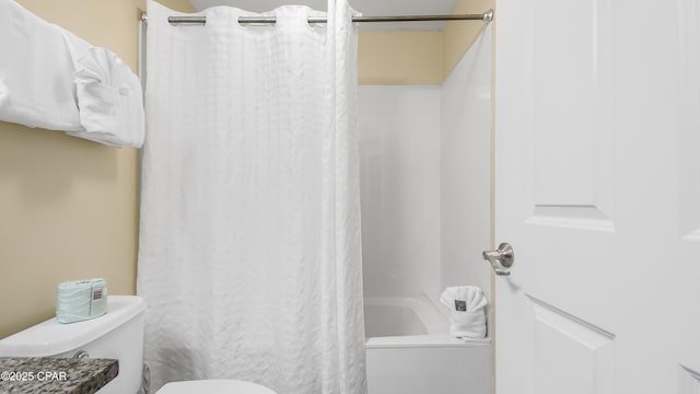 bathroom featuring toilet and shower / bathtub combination with curtain