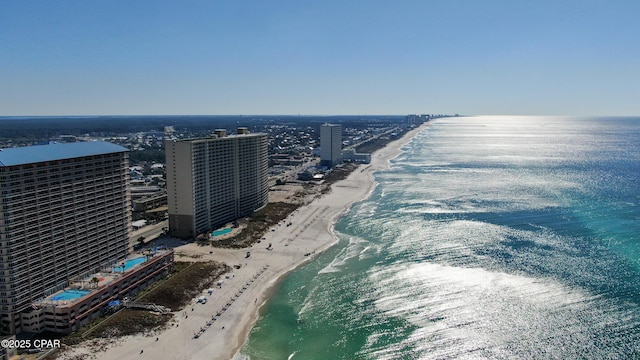 birds eye view of property with a city view, a view of the beach, and a water view