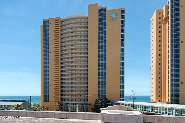 view of building exterior with a water view