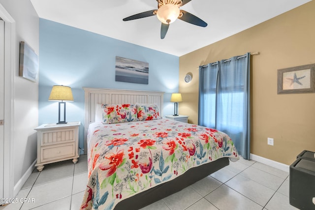 bedroom featuring light tile patterned flooring, ceiling fan, and baseboards