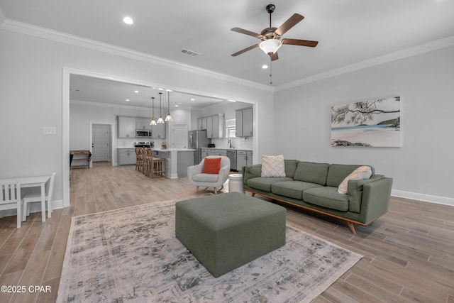 38 Cozy Cv, Freeport, FL 32439 - living area featuring recessed lighting, baseboards, light wood-style floors, visible vents, and a ceiling fan