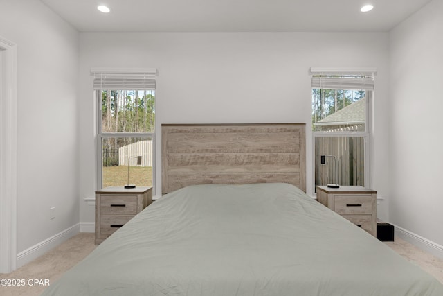 38 Cozy Cv, Freeport, FL 32439 - bedroom with multiple windows, recessed lighting, carpet floors, and baseboards