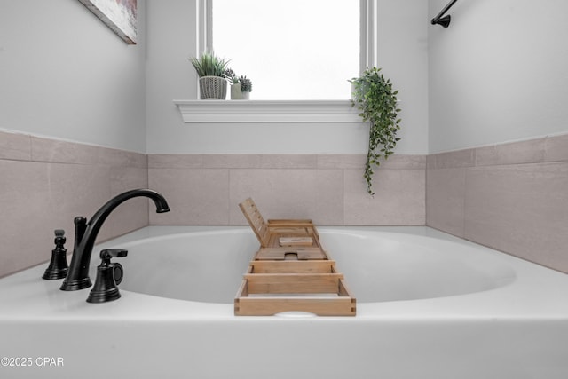 38 Cozy Cv, Freeport, FL 32439 - bathroom with a garden tub
