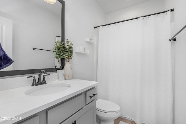 38 Cozy Cv, Freeport, FL 32439 - full bathroom featuring a shower with curtain, toilet, and vanity