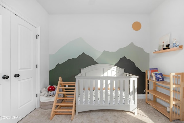 38 Cozy Cv, Freeport, FL 32439 - carpeted bedroom featuring a closet and a crib