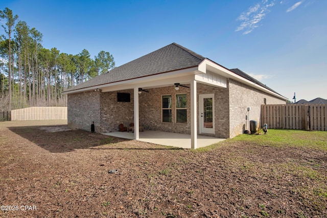 38 Cozy Cv, Freeport, FL 32439 - back of house featuring fence, a patio area, brick siding, and a ceiling fan