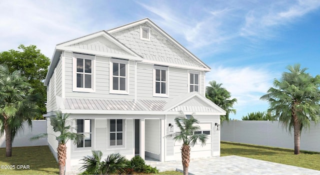 view of front of property with a front lawn, decorative driveway, fence, and covered porch