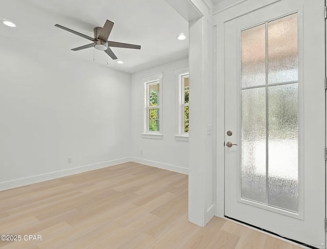 interior space featuring recessed lighting, light wood-type flooring, baseboards, and ceiling fan