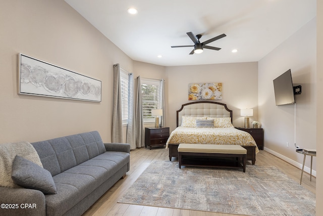 bedroom featuring a ceiling fan, recessed lighting, wood finished floors, and baseboards