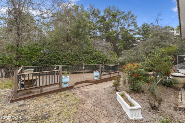 view of yard featuring a wooden deck