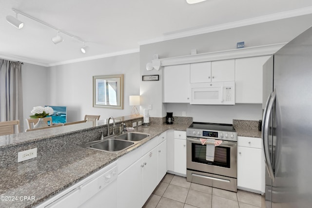 kitchen featuring white cabinets, crown molding, stainless steel appliances, and a sink