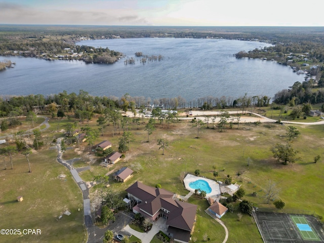 bird's eye view with a water view