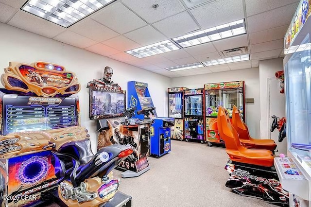 game room with a paneled ceiling, carpet, and visible vents