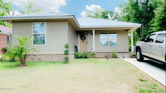 view of front of house with metal roof