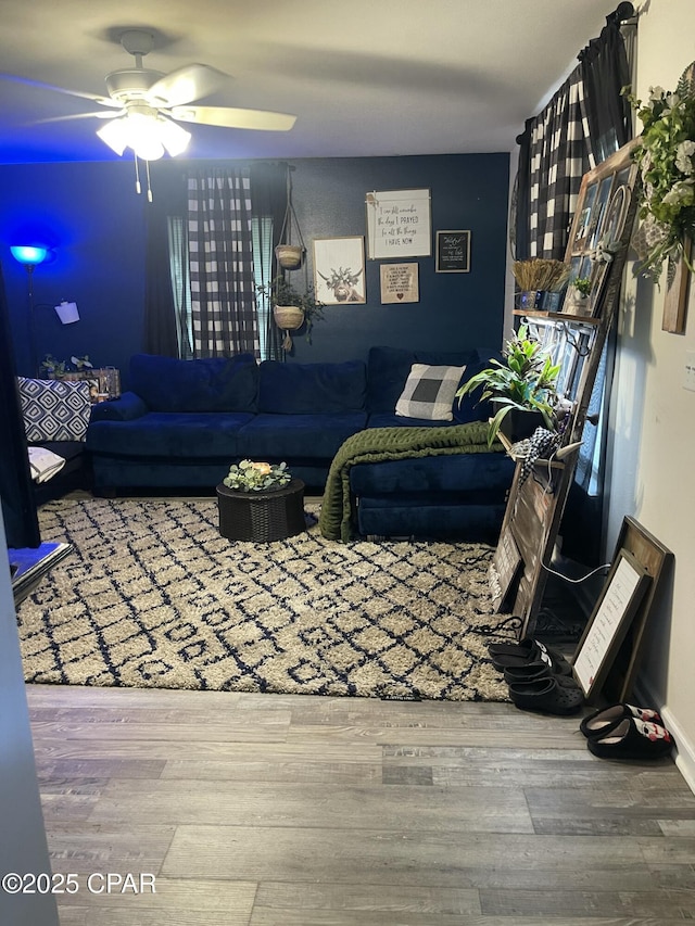 2838 Booker St, Marianna, FL 32448 - living area featuring a ceiling fan and wood finished floors