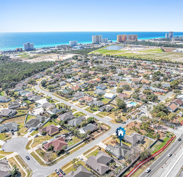 drone / aerial view with a water view