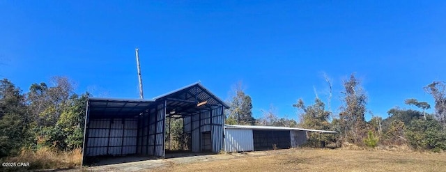 view of pole building with a detached carport