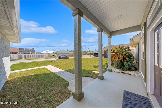 view of patio featuring fence