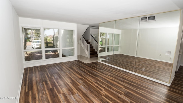 4305 Bay Point Rd Unit 459, Panama City, FL 32408 - interior space featuring stairs, baseboards, visible vents, and wood finished floors