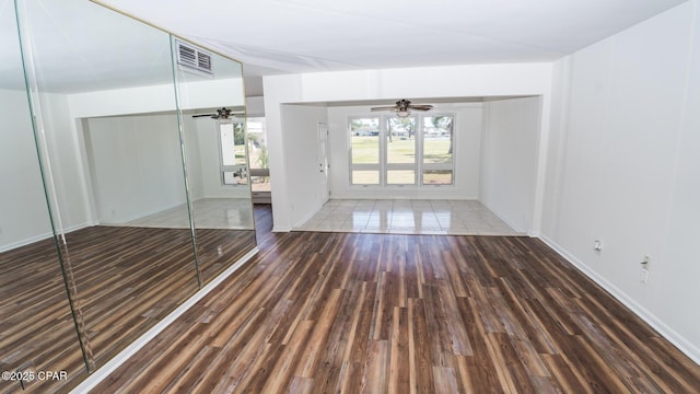 4305 Bay Point Rd Unit 459, Panama City, FL 32408 - interior space featuring baseboards, visible vents, wood finished floors, and a ceiling fan