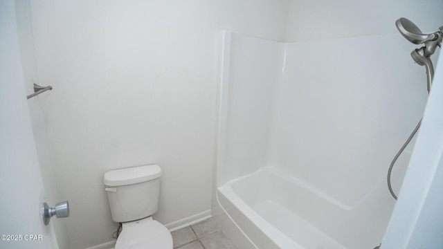 4305 Bay Point Rd Unit 459, Panama City, FL 32408 - full bath with tile patterned flooring, toilet, baseboards, and a shower