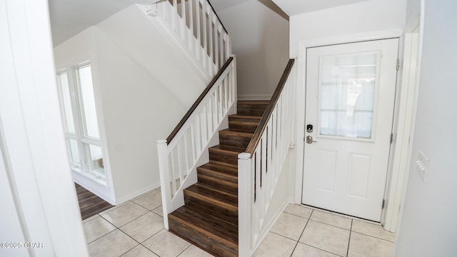 4305 Bay Point Rd Unit 459, Panama City, FL 32408 - entrance foyer featuring light tile patterned floors, stairway, and baseboards