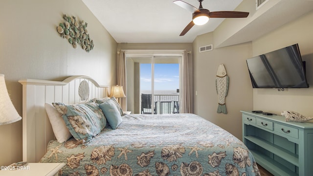 bedroom featuring access to exterior, visible vents, and a ceiling fan