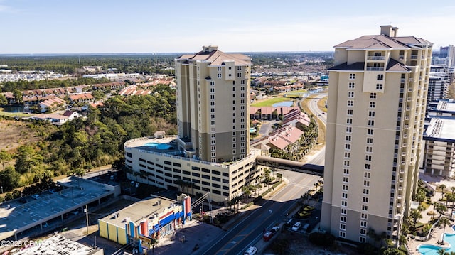 birds eye view of property featuring a city view