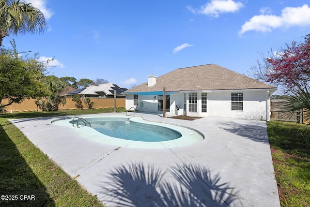 view of pool with a fenced backyard, a fenced in pool, and a patio