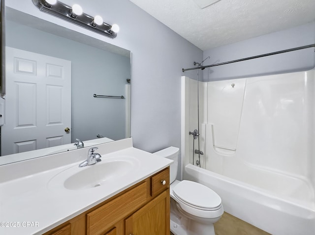 bathroom featuring shower / bath combination, a textured ceiling, vanity, and toilet