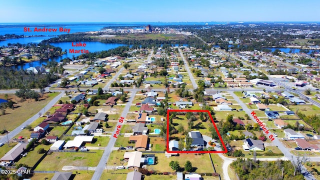 aerial view featuring a water view and a residential view