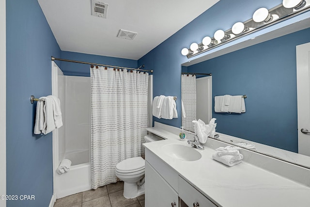 full bath featuring toilet, tile patterned flooring, visible vents, and vanity