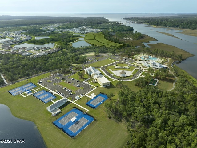 birds eye view of property with a water view