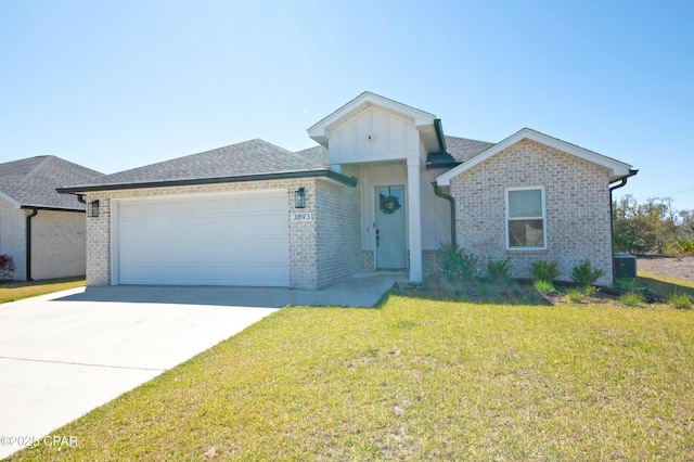 ranch-style house featuring brick siding, an attached garage, concrete driveway, and a front yard