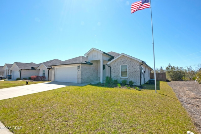 view of front facade featuring concrete driveway, a garage, brick siding, and a front yard