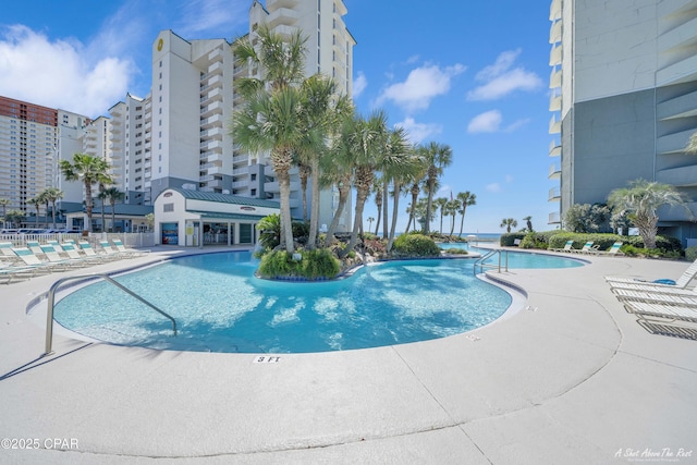 pool featuring a patio area