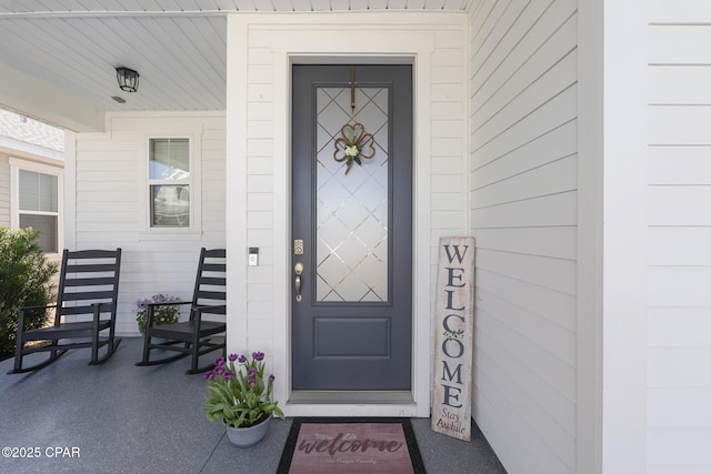 entrance to property with covered porch