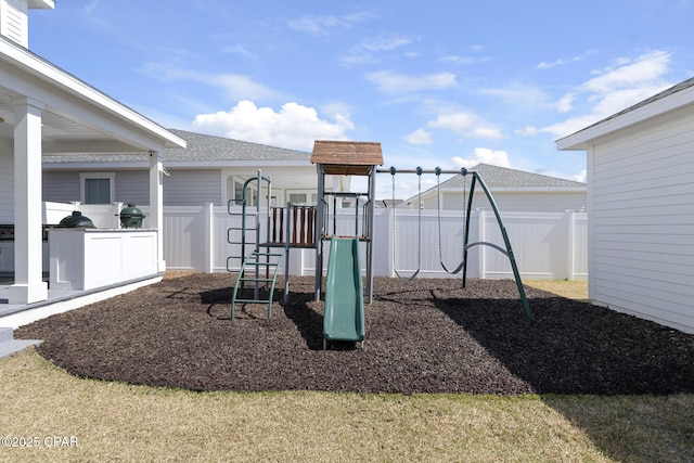 view of play area with fence