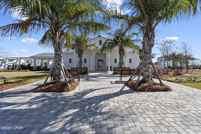 view of front of property with a pergola