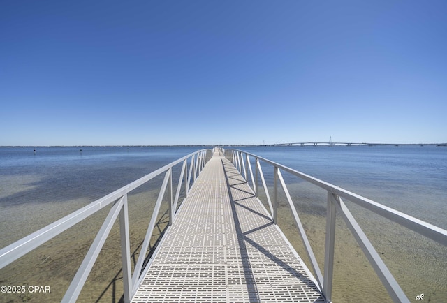 dock area featuring a water view