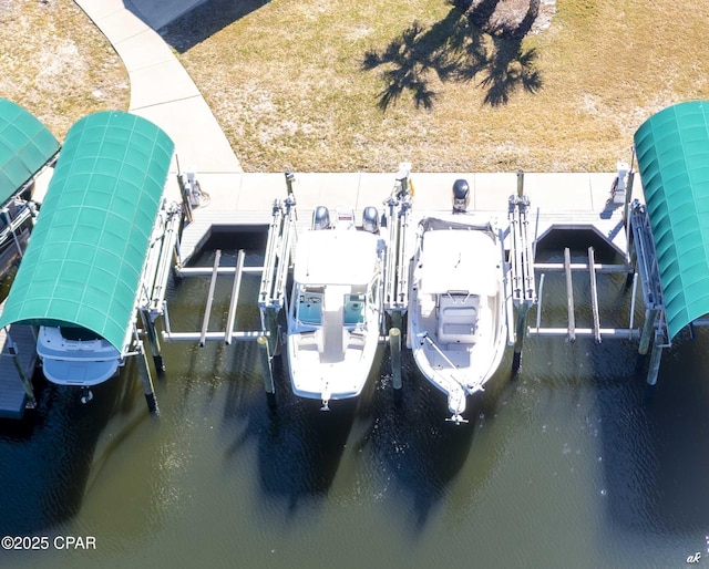 view of dock with a water view and boat lift