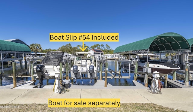 view of dock featuring boat lift and a water view