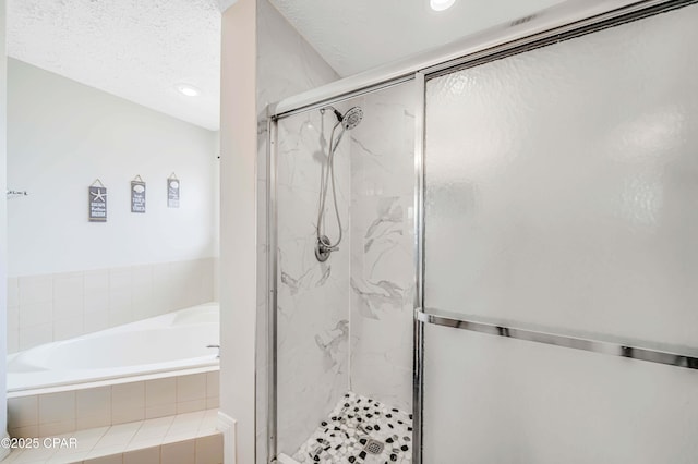 1705 Rhett Pl, Lynn Haven, FL 32444 - bathroom featuring a garden tub, a marble finish shower, and recessed lighting