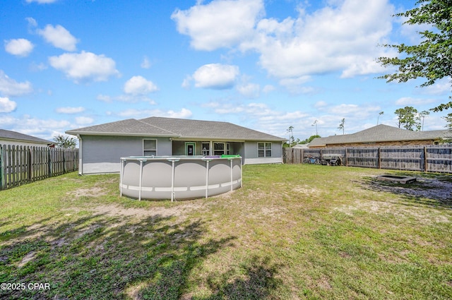 1705 Rhett Pl, Lynn Haven, FL 32444 - rear view of property featuring stucco siding