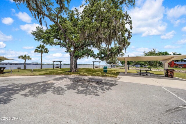 1705 Rhett Pl, Lynn Haven, FL 32444 - view of home's community with uncovered parking and a lawn